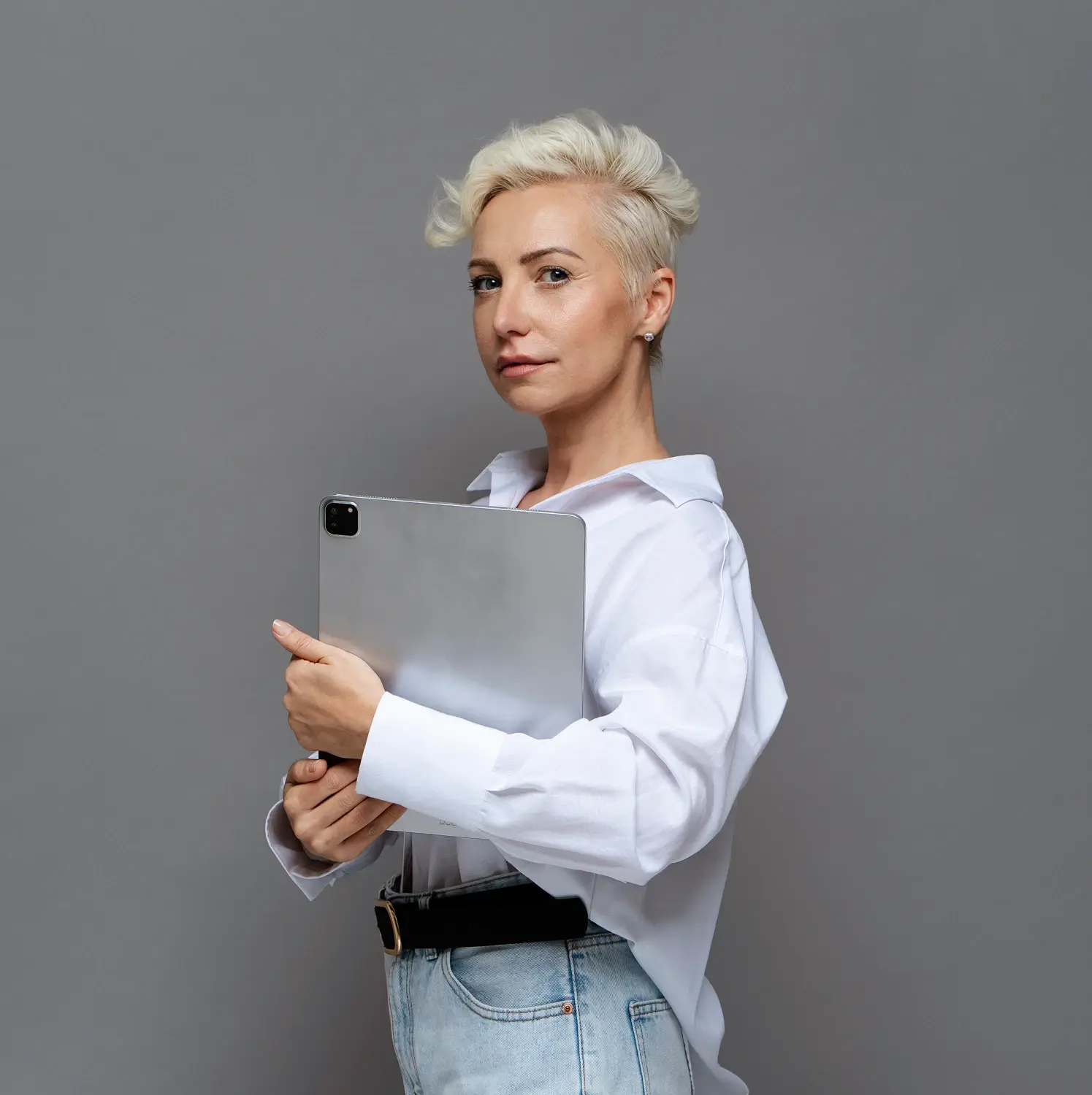 Business professional reviewing strategy using a digital tablet